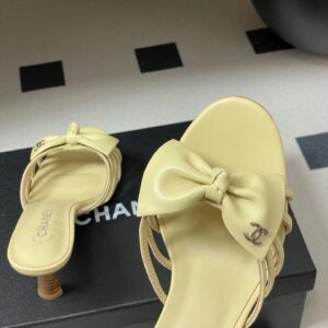 Chanel light-colored strappy bow spool heels